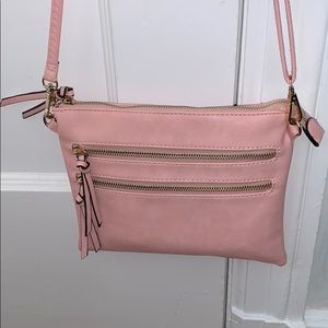 Light pink purse with adjustable handle